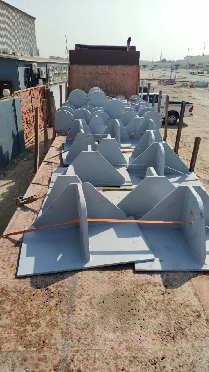 Steel support stools loaded on a flatbed truck