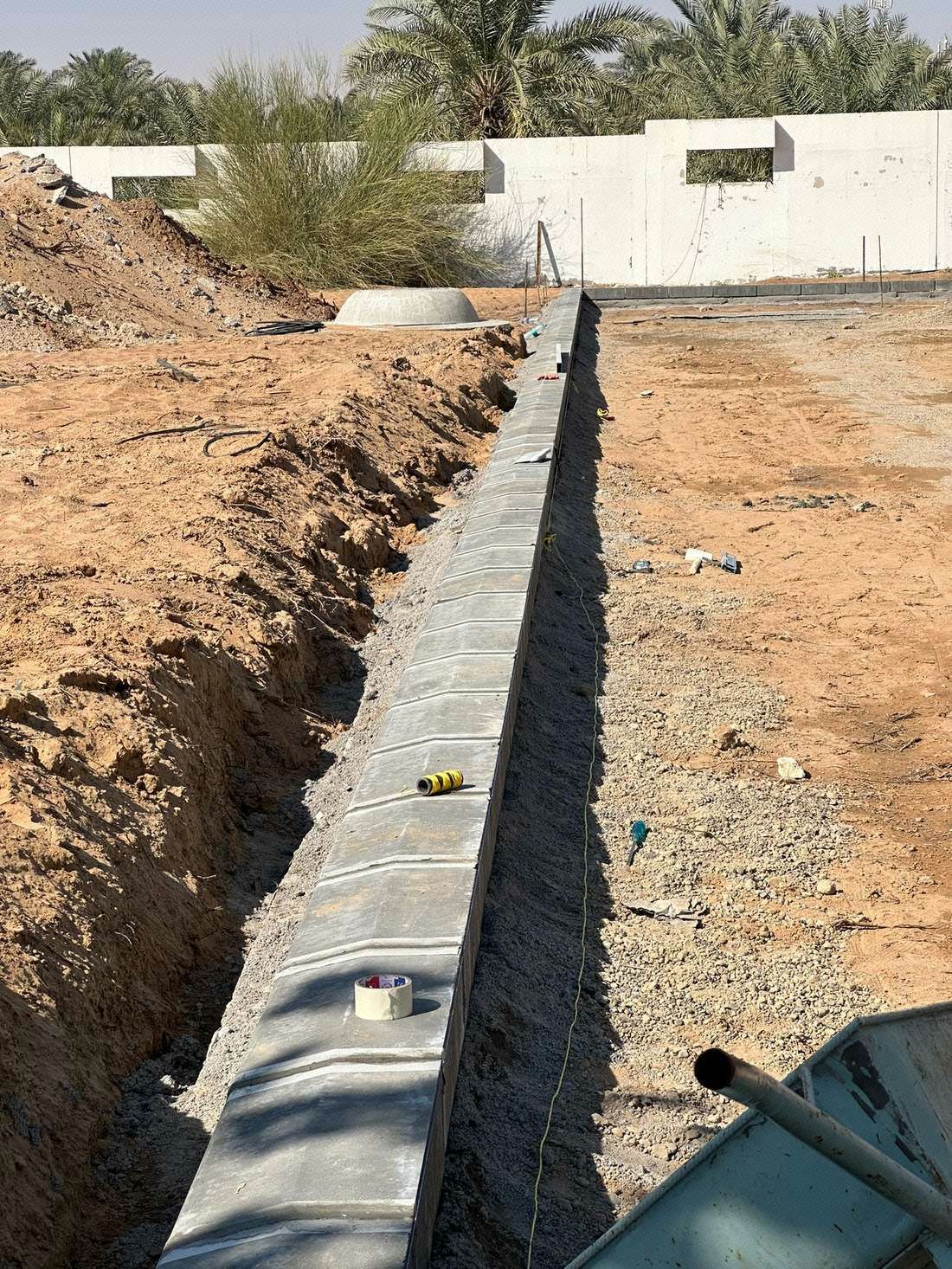 Ongoing installation of precast concrete kerbstones